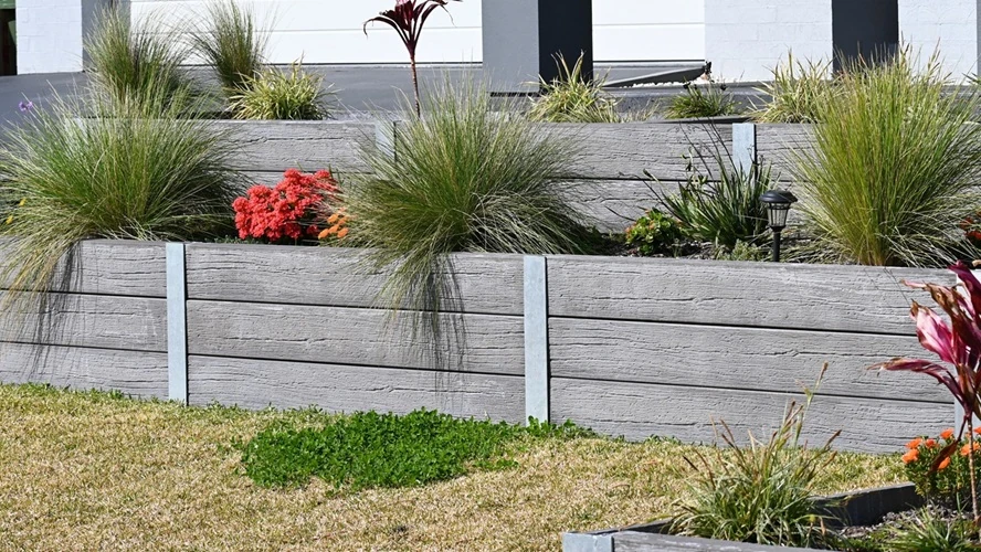hardscape-concrete-sleeper-retaining-wall-designed-look-500px Hardscape - Modern raised garden beds with decorative grasses and colourful flowering plants